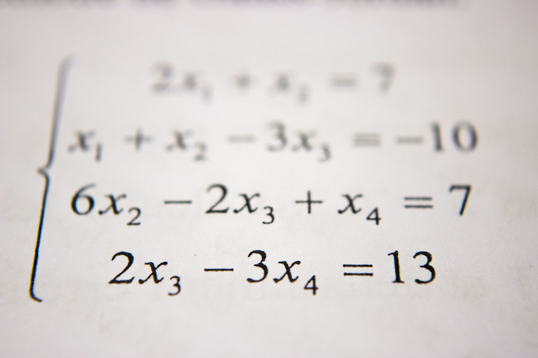Math worksheet with equations printed in black ink
